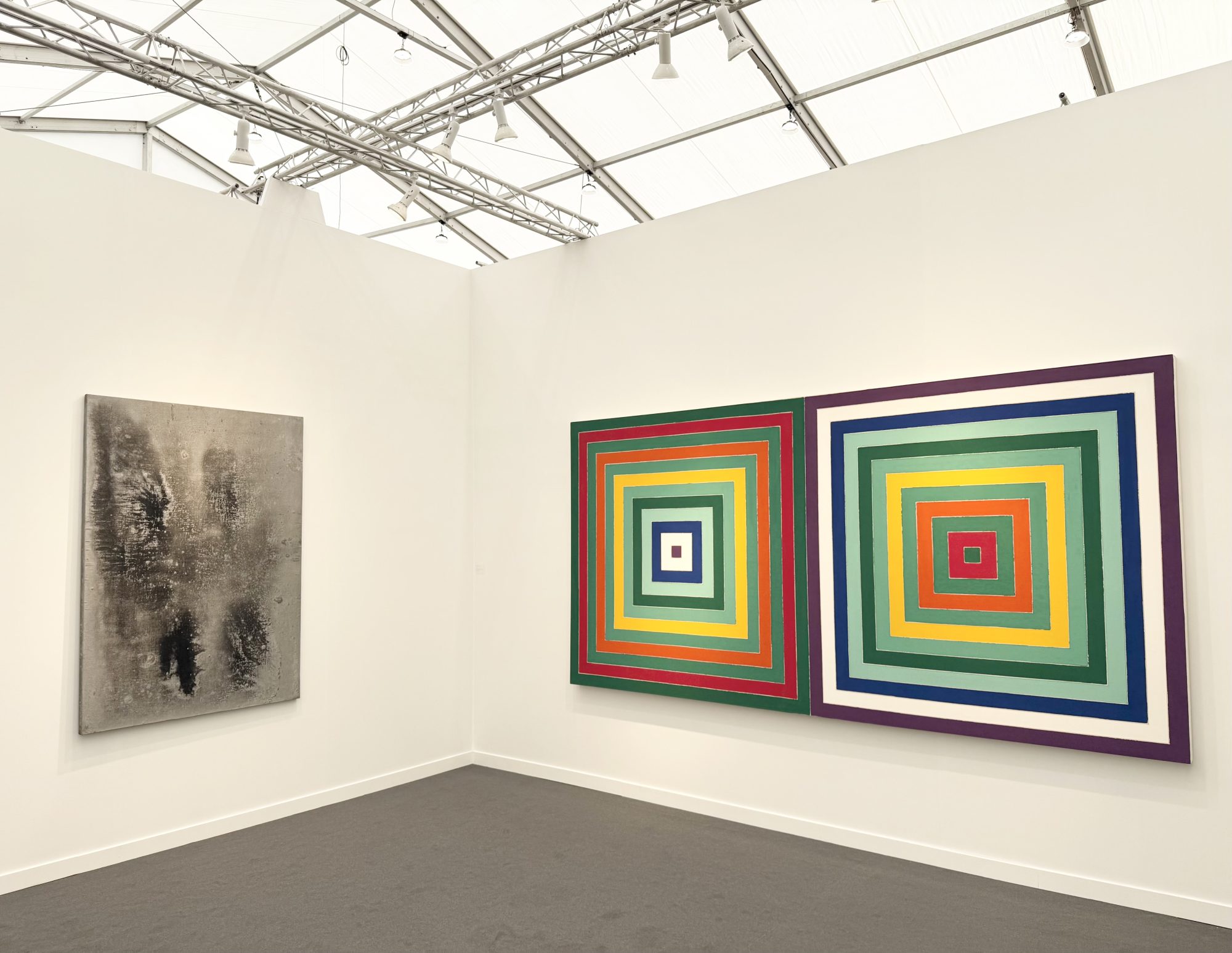 Works by Christopher Wool and Frank Stella at Cardi Gallery's booth at Frieze LA