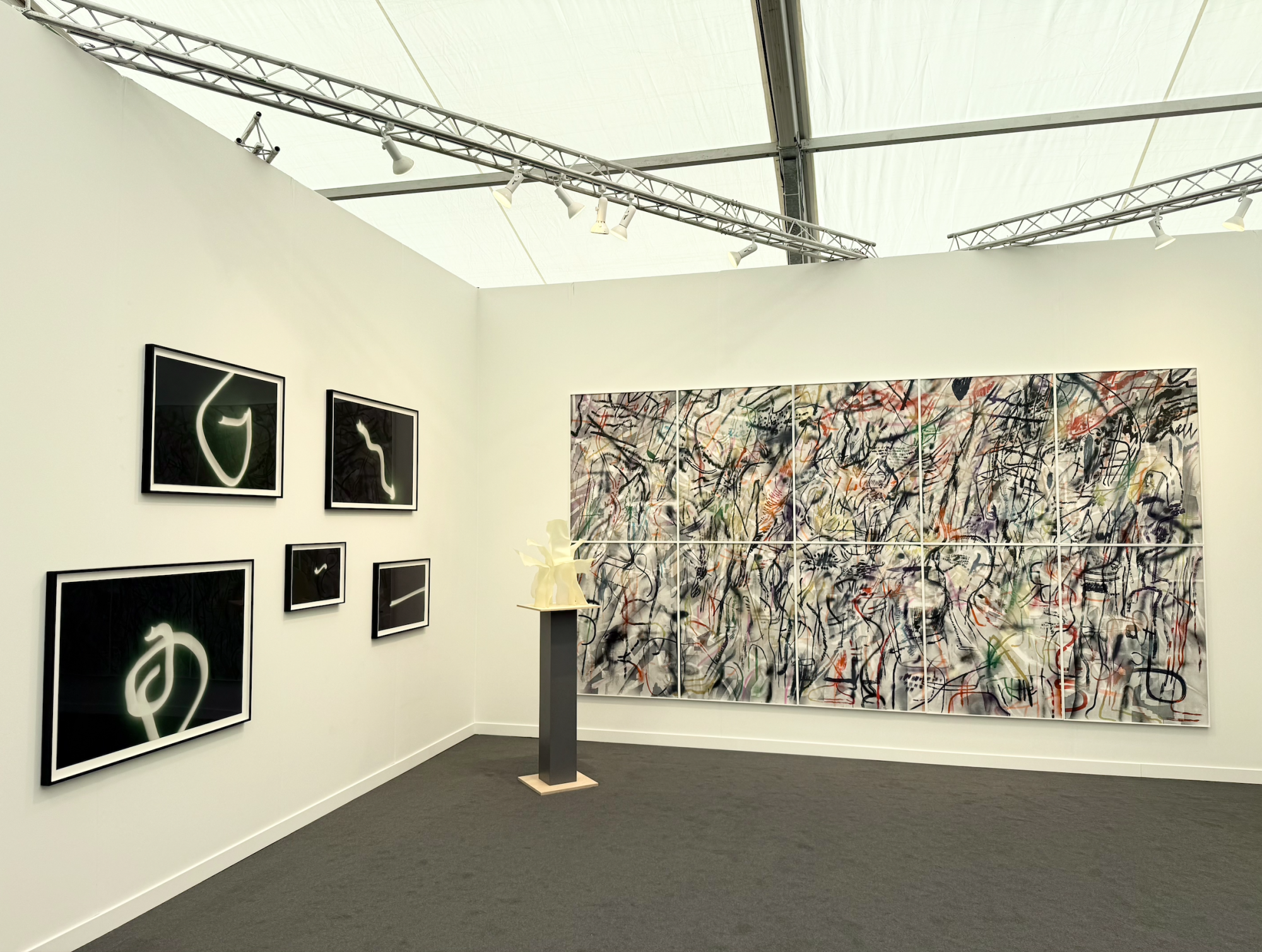 Gemini G.E.L.'s booth at Frieze LA, with works by Tacita Dean, Frank gehry, and Julie Mehretu
