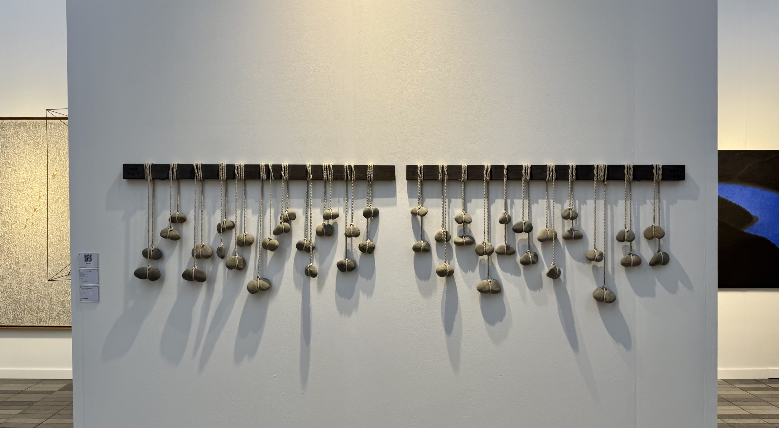 A mixed media piece of stone and rope by Korean artist Seung-taek Lee at Gallery Hyundai's booth at Frieze New York 2026