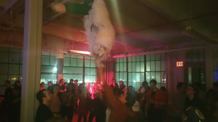 Attacking a massive piñata, via Art Observed